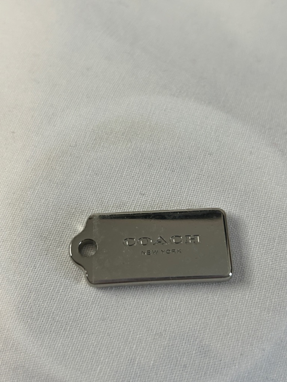 Coach Silver tone Rectangular Metal Tag Charm